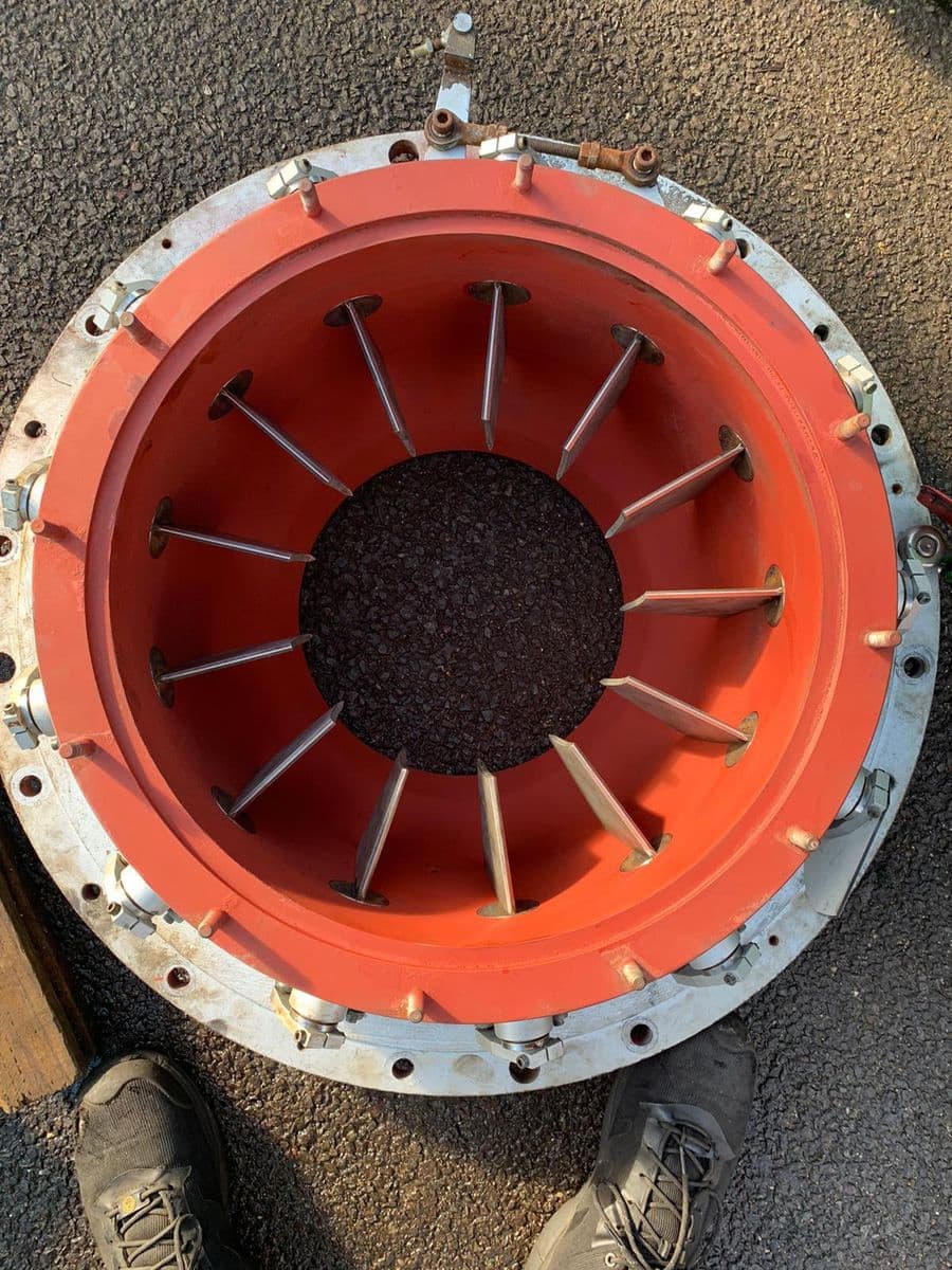 Orange blower inlet ring with radial stainless guide vanes