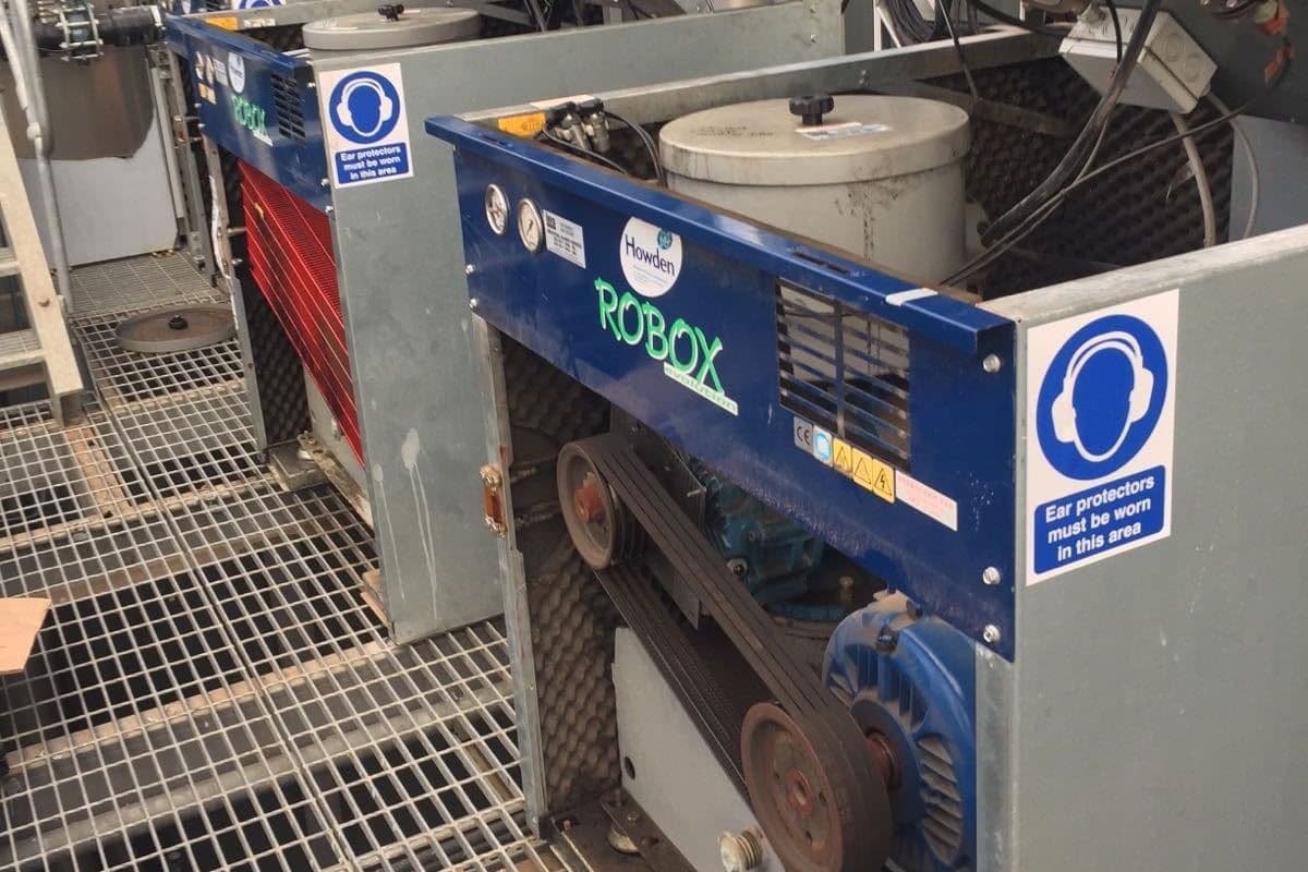 Howden Robox blower packages with acoustic hoods raised on a grating platform